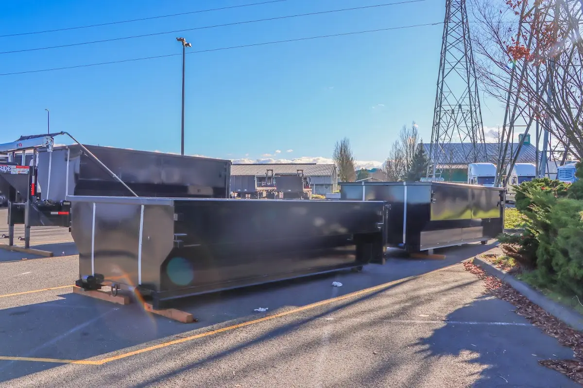 Roll-off dumpster ready for waste disposal at job site for 12 Yard Dumpster Rental in Cary